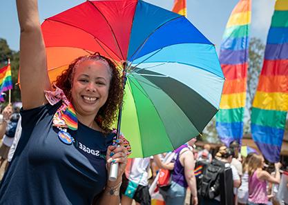 woman with multi-colored umbrella